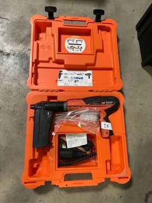 a tool in the case that is sitting on the floor
