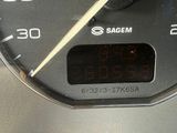 a close up of a speedometer on a car ' s dashboard