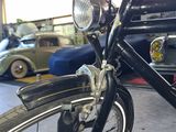 a close up of a bicycle in a garage