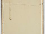 an old picture of a piece of paper hanging on a wall