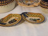 two bowls and two spoons sitting on a table