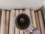 a person that is holding a cup in a box