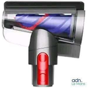un gros plan d'un aspirateur sur lequel brille un voyant rouge