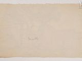 an old piece of paper with writing on it sitting on top of a table