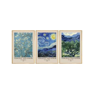 trois tableaux encadrés représentant des arbres et une lune dans le ciel
