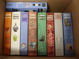 a box full of books sitting on top of a table