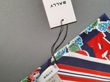 an image of a tie on a hanger with a tag on it
