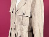 an image of a suit on a mannequin stand