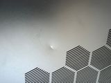 a hole in the ceiling of a room that has holes in it
