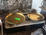 pots and pans are sitting on a stove in a kitchen