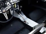 a close up of a car ' s dashboard and steering wheel
