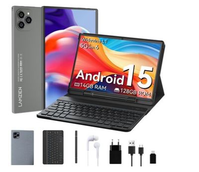 an image of a laptop with a keyboard and headphones next to it