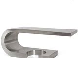 a close up of a metal object on a white background