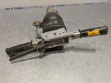 a close up of a drill with a wren on a table