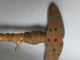 a wooden object with a string on top of it