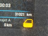 a close up of a car ' s dashboard showing the speed limit