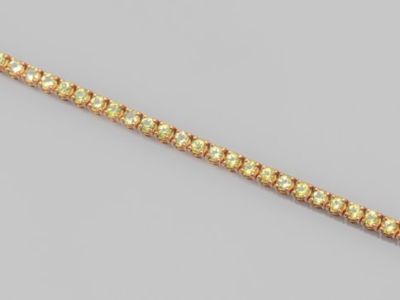 a diamond and eighteen - carat gold bracelet