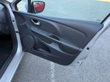 a car door open with the driver ' s side door open