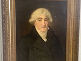 un vieux tableau représentant un homme vêtu d'un manteau noir et aux cheveux blancs
