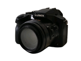 a picture of a camera with a lens attached to it