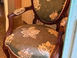 a chair that is sitting in the corner of a room