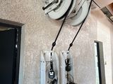 a wall with a bunch of electrical equipment hanging on it