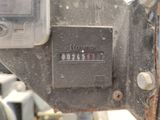 a close up picture of a meter on a pole