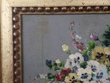 a painting of flowers in a vase on a table
