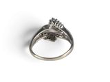 an image of a close up of a ring on a white surface