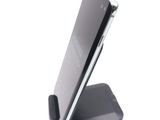 a cell phone that is sitting on top of a stand