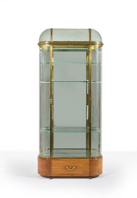 an antique display case with glass shelves and brass trims
