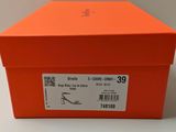 an orange box with a sticker on the side of it