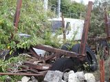 a truck that is sitting in a pile of rocks