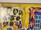 une image d'un tableau sur le mur d'une pièce