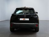 an image of a black car parked in a showroom