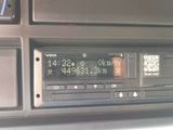 dashboard of a car with a digital clock on the dash