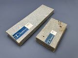 a couple of boxes that are sitting on top of a table