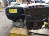 a small machine that is sitting on the side of the road