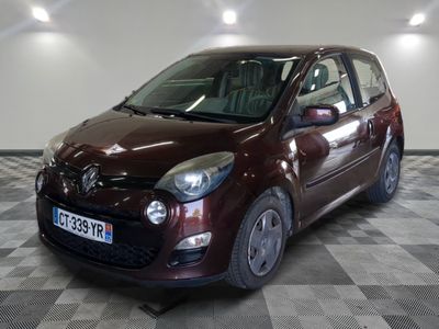 a picture of a maroon colored car parked in a garage