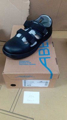 a box with a pair of shoes on top of it