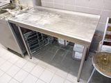 a kitchen with a sink and a dishwasher in it