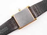 an image of a close up of a wrist watch on a white surface