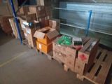 many boxes and boxes on a pallet in a warehouse