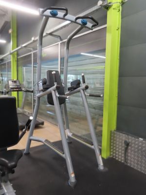 a view of a gym room with equipment in it