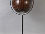 an image of a table lamp with a wooden sphere on a metal stand