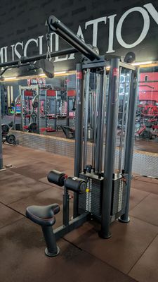 an image of a gym room with a lot of equipment
