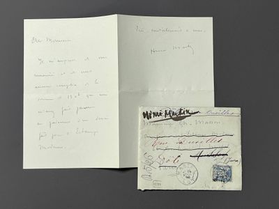un livre ouvert avec une feuille de papier et une feuille de papier sur laquelle il y a quelque chose d'écrit
