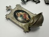 a picture of a picture of a woman and child in a pewed box