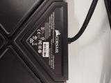 an image of a power supply that is plugged into a laptop