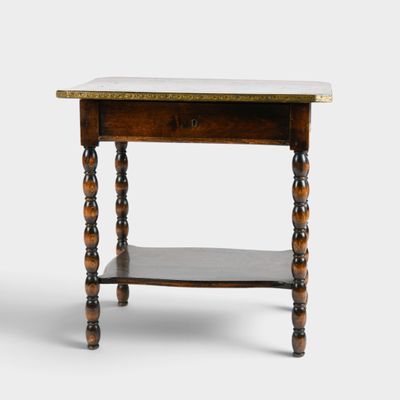 an old wooden table with a marble top on a white background